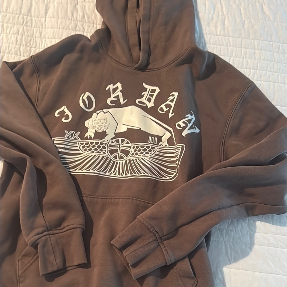 Jordan Brown Graphic Sweater with Distinctive Design